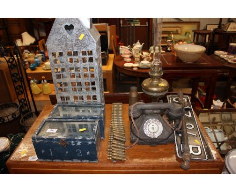 A rotary dial telephone; a brass oil lamp; number plate etc. 