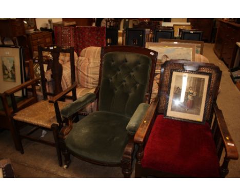 A late Victorian mahogany green upholstered button back armchair 