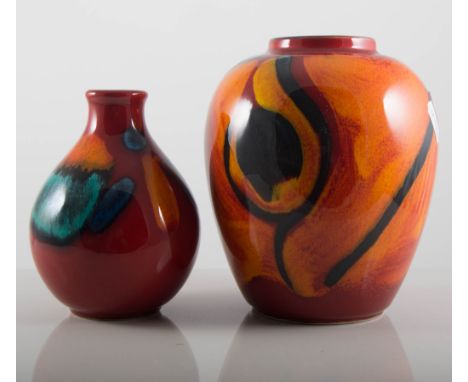 Poole Pottery Delphis orange ground, 35cm charger, three other plates, "Volcano", 12.5cm bud vase, "Peacock" 16cm ginger jar 