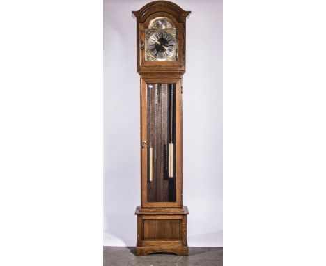 Reproduction oak longcase clock, arched brushed brass dial, three chain movement, striking on gongs, height 183cm.