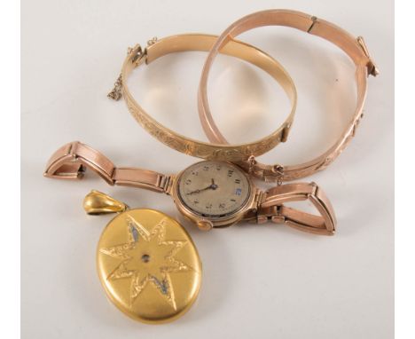 Collection of gold and plated jewellery, gold-plated oval locket, half hinged bangle, frost gilded oval metal locket, rings, 