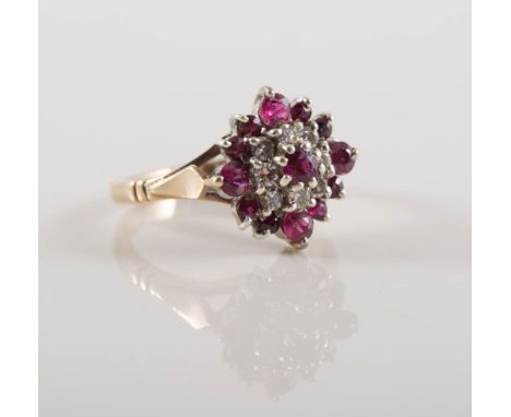 Ruby and diamond reverse cluster ring, rubies (13), diamonds (8), brilliant cut stones claw set in 9 carat yellow and white g