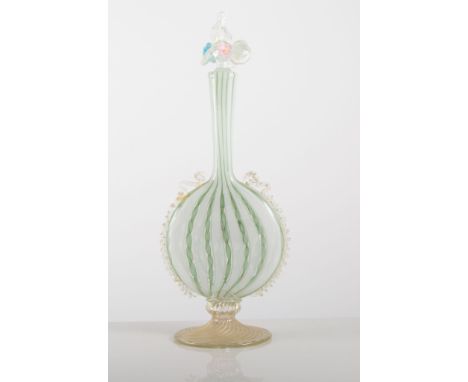 Murano glass decanter and stopper, flattened form, latticino with aventurine flecks, 30cm.