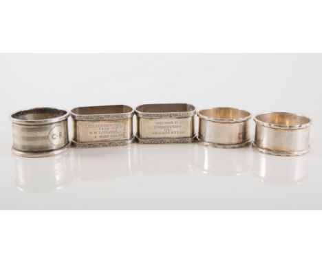 Five silver napkin rings, (all with monograms or personal inscription from all at H M S Helmsdale 1944), small oval silver pi