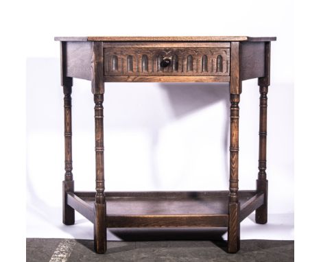 Modern oak hall table, knulled frieze drawer, turned and ringed legs joined by a shelf, width 87cms.