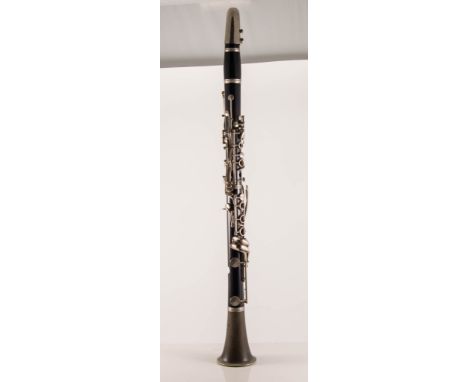 Corton Clarinet, 65cm, with sheet music.