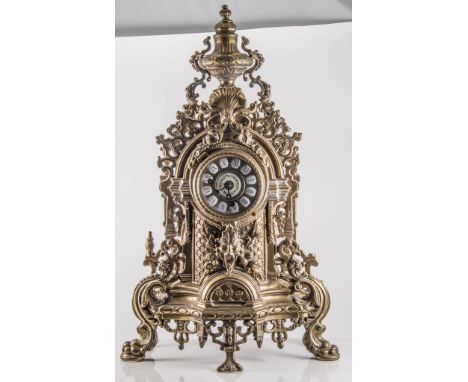 French-style cast brass mantle clock enamel numerals, cylinder movement striking on a bell, 61cm.
