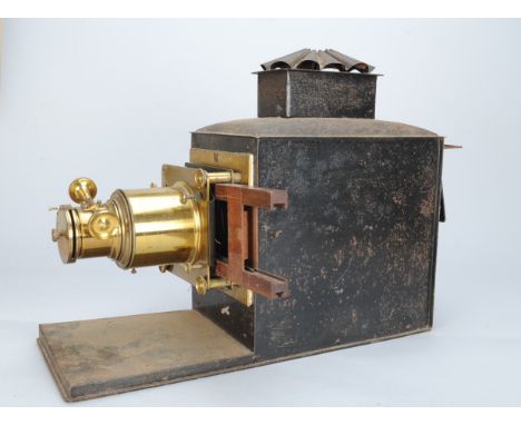 Magic Lantern, made by Newton and Co Russian iron and lacquered brass, with mahogany slide holder, no illuminant  