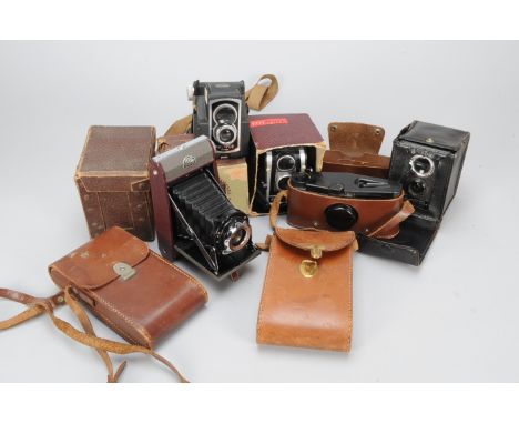 A Group of Ensign Roll Film Cameras, a Selfix 320, an All-Distance Pocket Ensign Model No 2 and a Ross Ensign Selfix Snapper 
