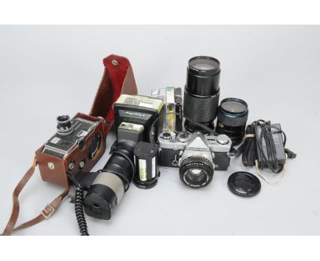 An Olympus OM-1N SLR Camera and Accessories, serial no 1993741, mirror stuck in raised position, with a Zuiko MC Auto-S 50mm 