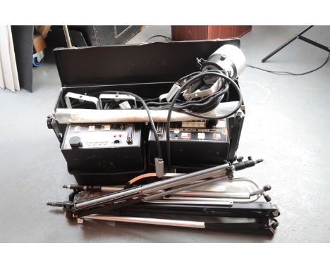 A Bowens Quad Studio Flash Kit, including 4 Quad 2000 flash heads, 2 control boxes, 2 snoots, 8 reflectors, a flash meter, 3 
