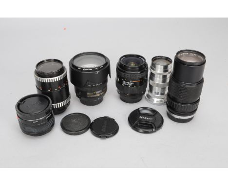 A Group of Sundry Camera Lenses, an AF-S Nikkor 18-70mm f/3.5-4.5G ED lens, an AF Nikkor 28-70mm f/3.5-4.5D lens, a Zuiko 75-