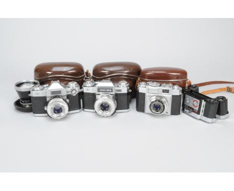 Zeiss Ikon Cameras, a Contaflex Super, Super B, Contina IIa, a 155mm f/4 Pro-Tessar lens, in bubble and two interchangeable b