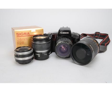 A Canon EOS Elan SLR Camera and EF Mount Lenses, including a Canon EOS Elan SLR camera with an EF 35-80mm f/4-5.6 lens, a Sig