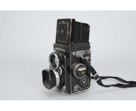 A Rolleiflex 2.8 F TLR Camera, serial no 24345802, with Carl Zeiss 80mm f/2.8 Planer lens, shutter working, light meter respo