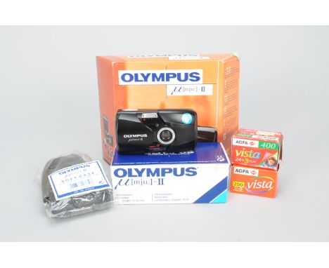 An Olympus mju II All Weather 35mm Compact Camera Kit, in makers box, with 35mm film, leather case, manual, guarantee certifi