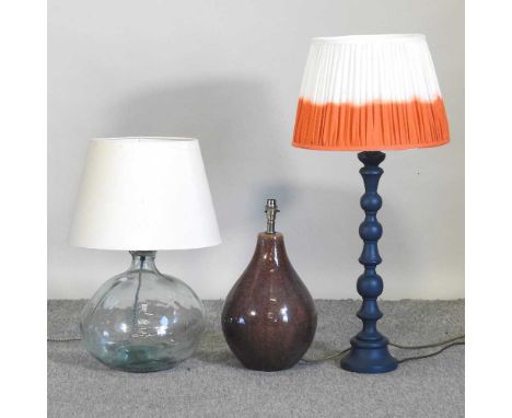 A large blue table lamp and shade, 86cm high overall, together with a glass table lamp and shade and another (3)