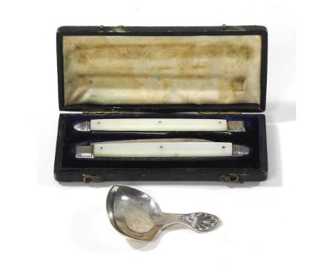 A George III travelling knife and fork set, of folding design with a mother of pearl handle, in a fitted case, 11cm, together