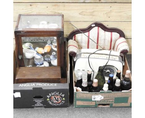 A vintage table top shop cabinet, 32cm wide, together with a games compendium, miniature sofa, Bush radio and bottled beers