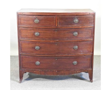 A 19th century mahogany and boxwood strung bow front chest, on swept bracket feet104w x 50d x 103h cm