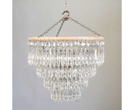An early 20th century four tier cut glass ceiling light, 30cm diameter
