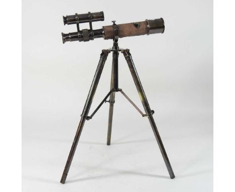 A modern metal desk telescope, on an adjustable tripod stand, 26cm long