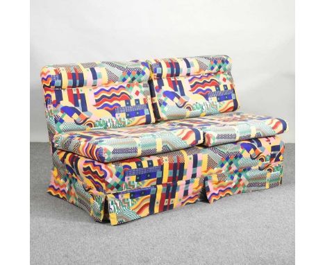 A modern two seater sofa, brightly upholstered in Bauhaus for Liberty pattern fabric159w x 80d x 92h cm