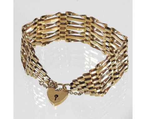 A 9 carat gold gate bracelet, with a padlock shaped clasp, 15g gross, approximately 24mm wide