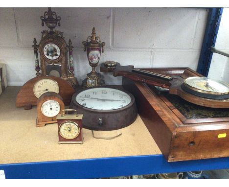 Group of clocks, including a French gilt and porcelain mantel clock with matching urn, an American wall clock, together with 