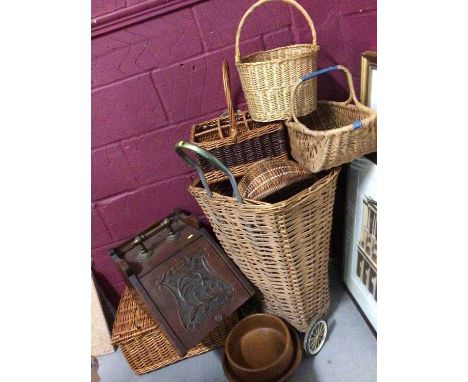 Group of wicker baskets, picnic hamper, wooden trug, two wooden bowls and a carved wood coal scuttle