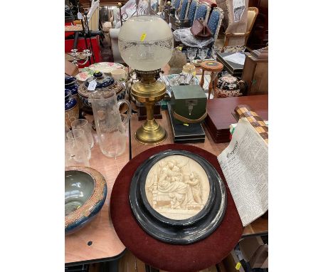 Brass oil lamp, wind gauge, miniature long case clock, oval relief plaque and sundry items