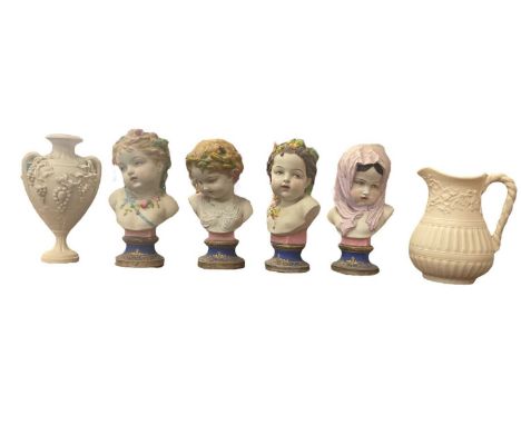 Set of four 19th century continental porcelain busts depicting the four seasons, each on a socket base. Together with a 19th 