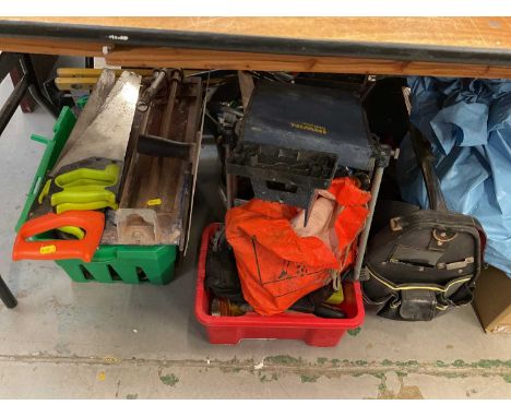 Collection of various hand tools, together with a table saw.