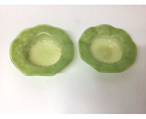 Pair of Art Nouveau style Vaseline glass dishes with wavy edges, in the style of Powell, 21.5cm diameter