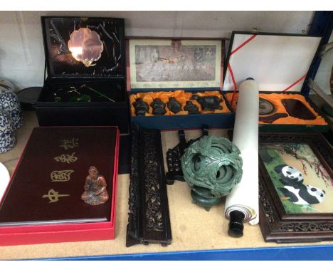 Group of Chinese items, including a hardstone puzzle ball, figure of Guanyin, scroll, embroidery, etc
