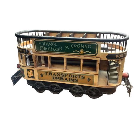 Decorative French painted wooden and metal model of a tram decorated with advertising banners