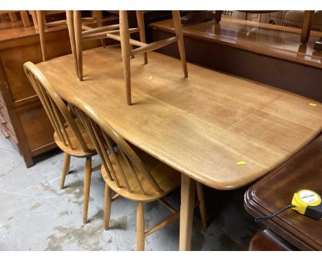 Set of four Ercol stick back chairs and an Ercol dining table