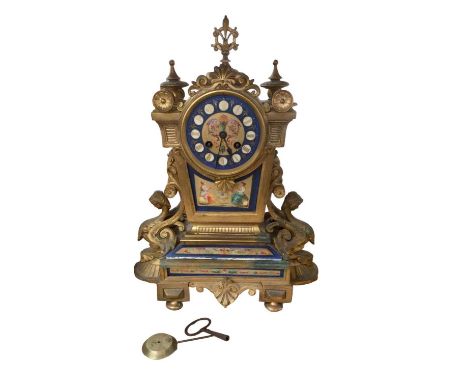 French gilt metal and porcelain mounted mantel clock, with key and pendulum, 41cm high, and a Swiza alarm clock