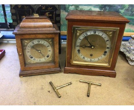 Two modern mantel clocks, including an Elliott (2 keys included)Larger clock ticks when wound, smaller clock doesn't