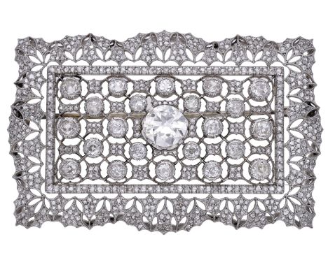 A diamond panel brooch by Buccellati, circa 1950, the rectangular plaque brooch centred with a brilliant-cut diamond within p