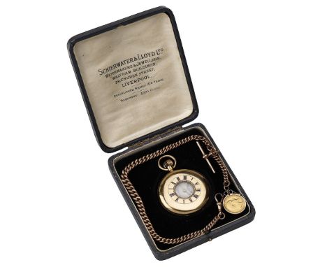 Cooke & Kelvey, Calcutta. A gold half-hunting cased keyless watch with gold Albert chain, circa 1910. Movement: gilded three-