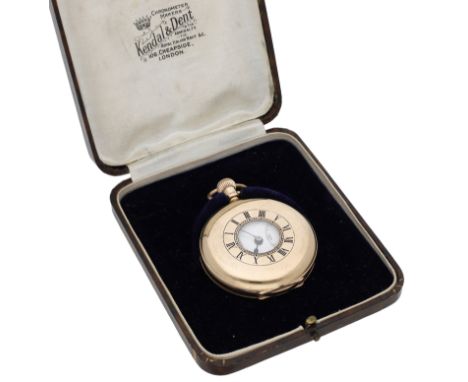 Kendall & Dent. A gold half-hunting cased keyless watch, circa 1929. Movement: manual winding, lever escapement. Dial: white 