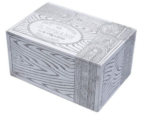 A Russian silver trompe l’oeil cigar box, St. Petersburg, 1891, of rectangular form, engraved and designed to simulate a wood