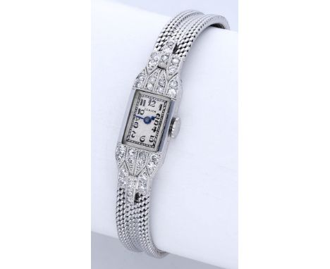 Zenith. A lady’s rectangular platinum and diamond-set cocktail watch, circa 1930. Movement: manual winding, 17 jewels, no. 72