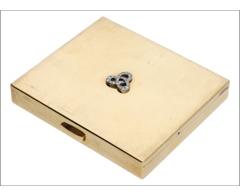 A gold compact by Cartier, circa 1930, of rectangular form with applied interlocking trefoil motif set with single-cut diamon