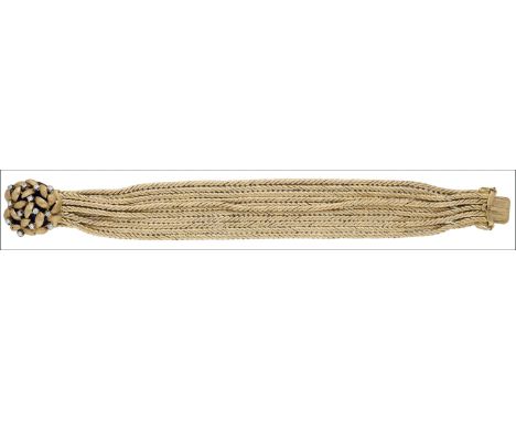 A multi-strand bracelet, composed of eleven flat ropetwist chains with textured finish, to a domed clasp of overlaid foliate 