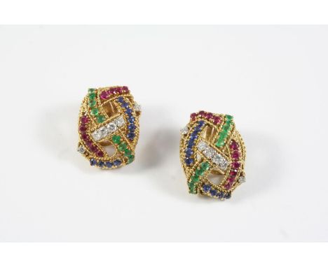 A PAIR OF RUBY, SAPPHIRE, EMERALD AND DIAMOND EARCLIPS each earring mounted with circular-cut rubies, sapphires, emeralds and