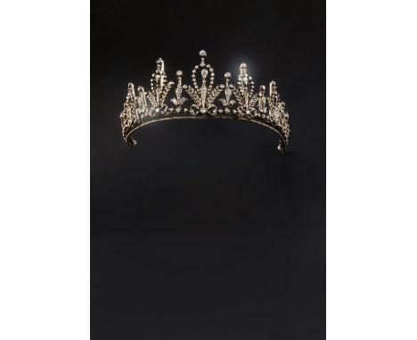 A VICTORIAN DIAMOND TIARA formed with nine graduated foliate, swag and ribbon sections, each set with circular old cut diamon
