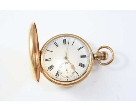 A 9CT GOLD HALF HUNTING CASED POCKET WATCH the white enamel dial with Roman numerals and subsidiary seconds dial, 50mm dia., 