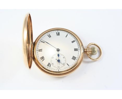 A 9CT GOLD HALF HUNTING CASED POCKET WATCH the white enamel dial with Roman numerals and subsidiary seconds hand,  50mm dia.,